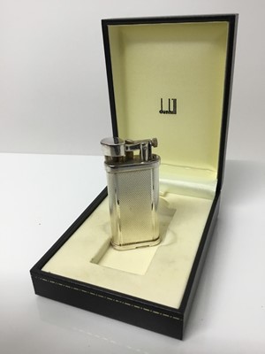 Lot 385 - Vintage Dunhill silver plated pocket lighter with engine turned decoration, 6.5cm high, in original fitted box