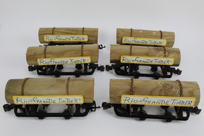 Lot 1499 - Railway LGB Selection of unboxed rolling stock including tippers, log carriers, coaches etc, in four boxes.