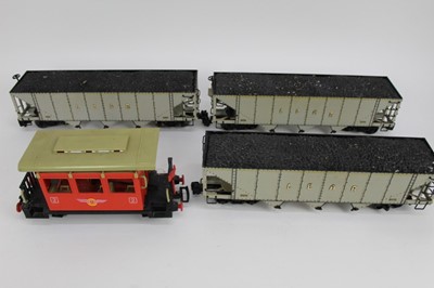 Lot 1499 - Railway LGB Selection of unboxed rolling stock including tippers, log carriers, coaches etc, in four boxes.