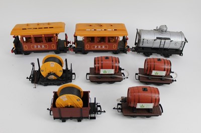 Lot 1501 - Railway unboxed selection of garden railway, road trailers, cable wagons, oil tanker car.  Various manufacturers in three boxes.