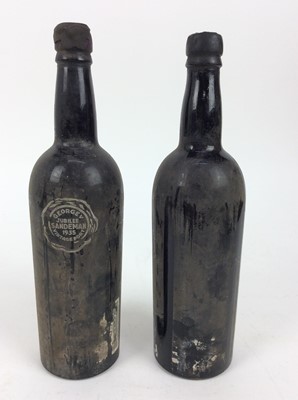 Lot 127 - Port - two bottles, Sandeman George V Jubilee 1935, bottled 1937 George VI Coronation, together with another bottle lacking label
