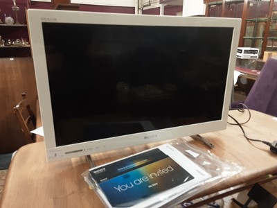 Lot 2 - Sony Bravia flatscreen television model number KDL-24EX320, with manual and remote control