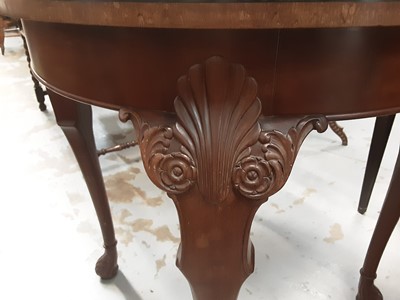 Lot 1092 - Walnut and mahogany centre table with circular top on carved cabriole legs, 75cm diameter