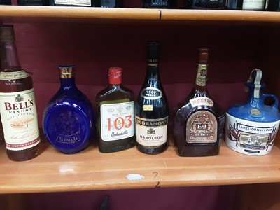 Lot 133 - Six bottles of alcohol - Bell's Whisky, Dimple Whisky, Bobadilla Brandy, Napoleon French Brandy, E&J Brandy and Lambs 100 Navy Rum