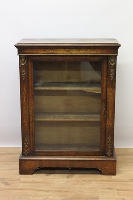 Lot 651 - Victorian walnut and marquetry inlaid pier cabinet, with glazed door and gilt metal mounts and shaped plinth base