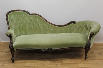 Lot 613 - Victorian walnut framed chaise longue, with green button upholstery and carved showwood frame on cabriole legs and castors