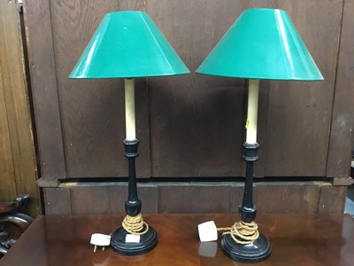 Lot 219 - Pair of ebonised table lamps with green shades