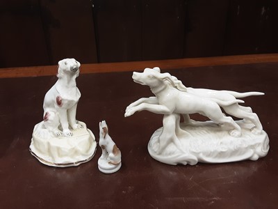 Lot 141 - Early 19th century novelty porcelain whistle in the form of a begging dog and three other dog ornaments