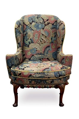 Lot 661 - Early 18th century walnut wing armchair