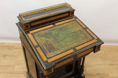 Lot 716 - Victorian aesthetic period ebonised and amboyna inlaid piano-top davenport desk