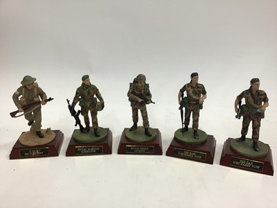 Lot 1525 - Metal Military model figures on wooden bases with Chinook and Hercules Aircraft.