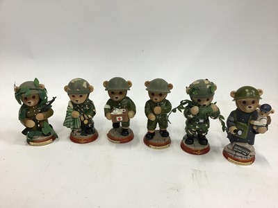 Lot 1525 - Metal Military model figures on wooden bases with Chinook and Hercules Aircraft.