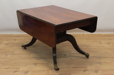 Lot 684 - Regency style mahogany extending pedestal dining table