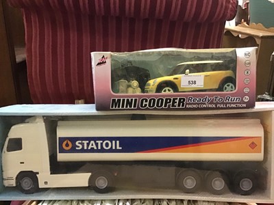 Lot 538 - Meek model Statoil tanker, Mini Cooper radio controlled car, vintage fire engine and Routemaster double decker bus