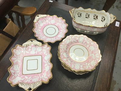 Lot 75 - 19th Century English porcelain (possibly Minton) part desert service with pate sur pate decoration on pink ground