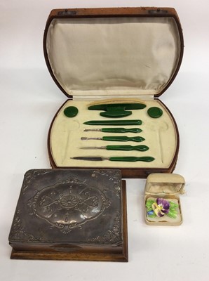 Lot 658 - Silver topped wooden jewellery box, ceramic flower brooch and a manicure set in case