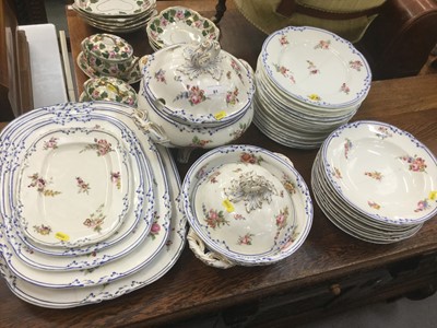 Lot 81 - Group of 19th century dinnerware with floral decoration and blue painted borders