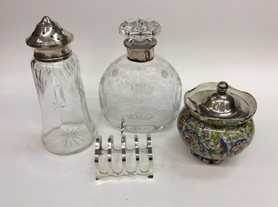 Lot 664 - Silver toast rack, silver topped glass and silver topped preserve pot