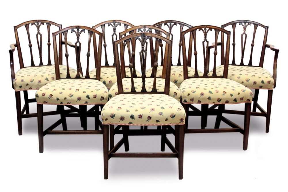 Lot 764 - Set of eight Regency mahogany dining chairs, each with pierced vertical splat back and floral patterned stuffover seat on square tapered legs and stretchers