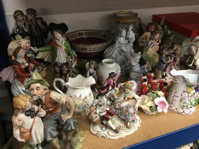 Lot 110 - Mixed group of decorative ceramics to include German porcelain table centre, early 20th century Continental porcelain figures, Burleighware puzzle jug and other items