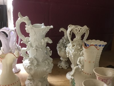 Lot 497 - Collection of Victorian white glazed Parian ware jugs, by Minton and others, with applied and moulded ornament, approximately 15