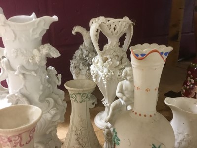 Lot 497 - Collection of Victorian white glazed Parian ware jugs, by Minton and others, with applied and moulded ornament, approximately 15