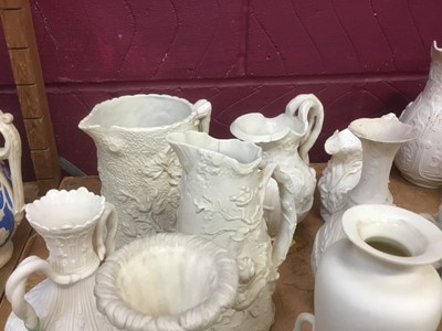 Lot 499 - Good collection of Victorian white glazed Parian ware jugs