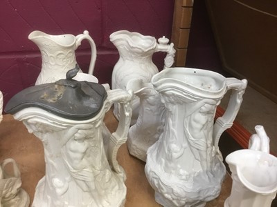 Lot 499 - Good collection of Victorian white glazed Parian ware jugs