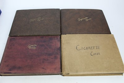 Lot 1117 - Cigarette cards in albums mostly Players and Wills including f;owers, butterflies curious beaks etc.