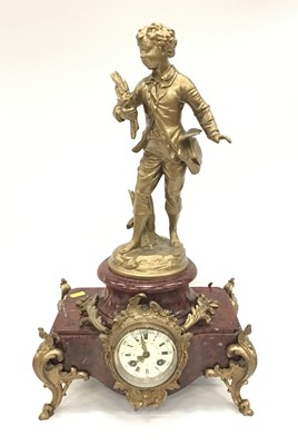 Lot 1881 - French figural spelter and rouge marble mantel clock, circa 1900, signed Brouchon, 56cm height