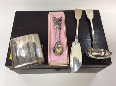 Lot 694 - Silver cigarette case, silver fish knife, silver pierced bowl ladle and two white metal souvenir spoons