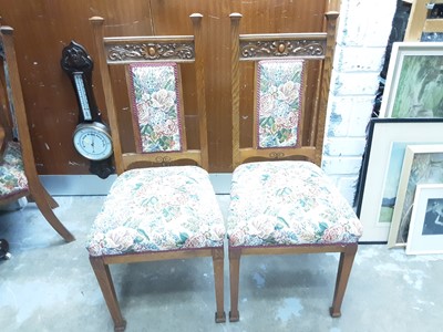 Lot 1041 - Set of 6 good quality Edwardian Arts & Crafts carved oak dining chairs, the high padded backs with carved frieze, on square taper legs