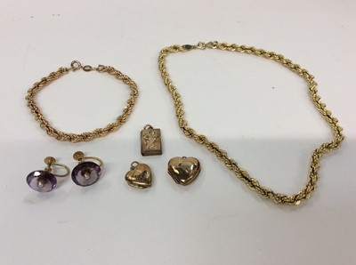 Lot 699 - Two 9ct gold rope twist chains, three lockets and pair 9ct gold mounted purple stone screw back earrings