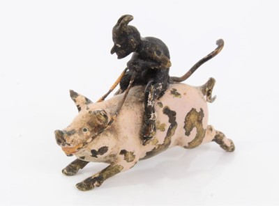 Lot 372 - Novelty cold painted bronze model of a pig ridden by the devil