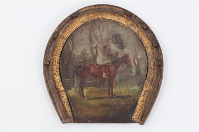 Lot 969 - Edwardian horseshoe memorial with painted bay horse to centre