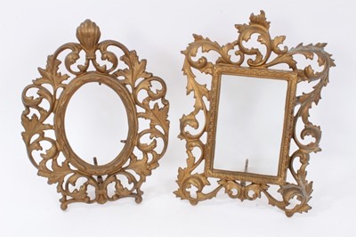 Lot 371 - Two Victorian brass photograph frames with scroll supports