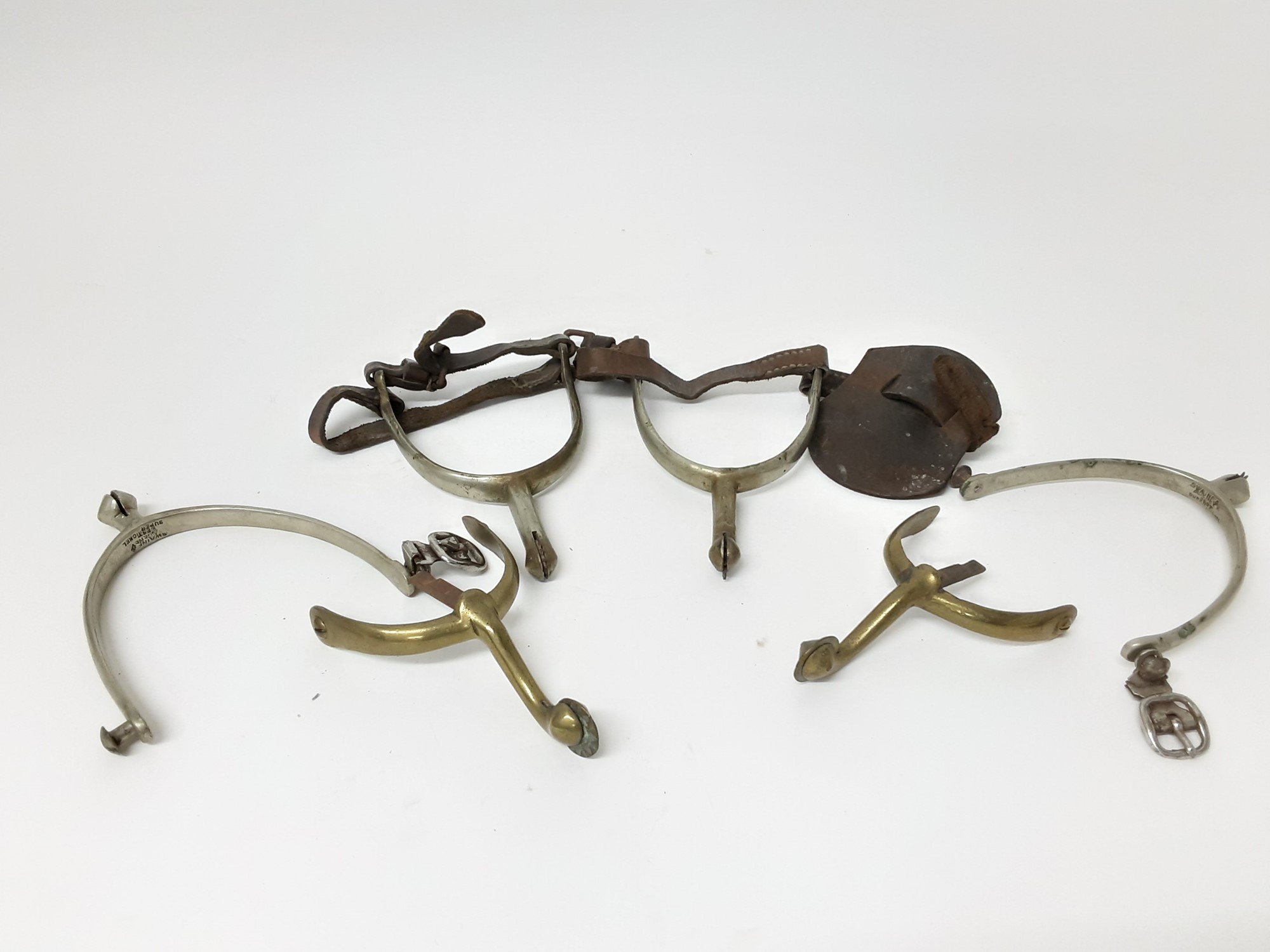 Lot 998 Three pairs of vintage spurs