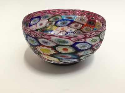 Lot 129 - Cantonese famille rose charger, fish gluggle jug and a glass millefiori bowl