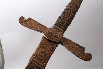 Lot 332 - Impressive Victorian theatrical parade sword with gilt metal mounts, cruciform hilt with Royal Arms to crossguard and velvet covered and gilt brass mounted scabbard ( no blade) 140 cm overall