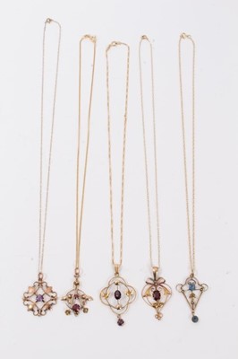 Lot 11 - Five Edwardian 9ct gold gem set open work pendants on 9ct gold chains