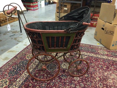 Lot 2073 - Victorian style wooden handled pram with metal wheels