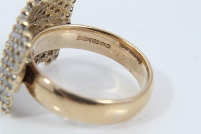 Lot 23 - 9ct gold diamond set plaque ring