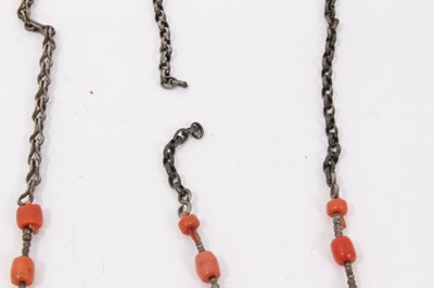 Lot 44 - Three old Chinese coral bead necklaces with white metal horse pendants