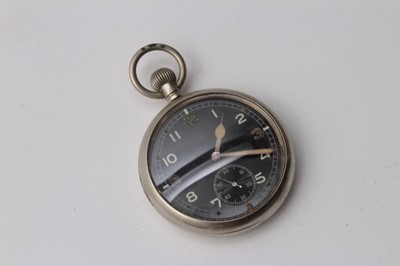 Lot 202 - Second World War G.S.T.P open face pocket watch, with black dial, luminous Arabic numerals, minute, subsidiary seconds and button wind movement, rear of case, stamped G.S.T.P, Q2662