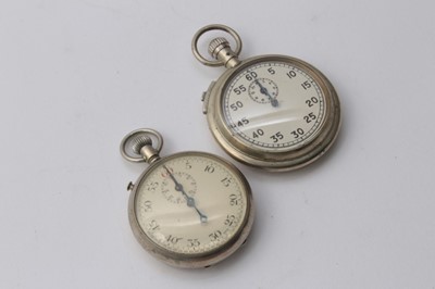Lot 204 - Two Second World War period open face military stopwatches, with white dials and button wind movements, rear of cases marked with broad arrow marks (2)