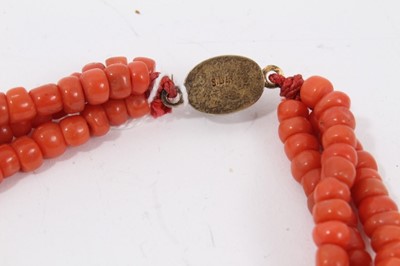 Lot 47 - Old Chinese coral three stand rope twist necklace with silver gilt clasp, 54cm long
