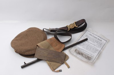 Lot 214 - Group of Second World War related ephemera to include A.R.P. manuals, Royal Artillery belt, reproduction cap and other items.