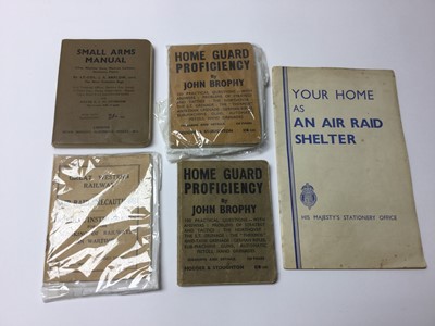 Lot 214 - Group of Second World War related ephemera to include A.R.P. manuals, Royal Artillery belt, reproduction cap and other items.