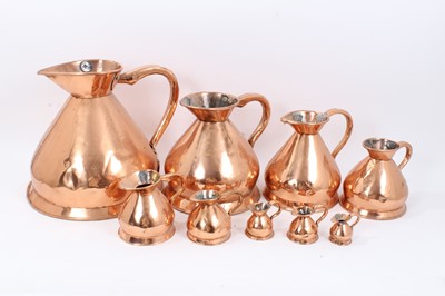 Lot 690 - Graduated set of nine brass measures