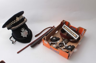 Lot 215 - Group of Essex Police related items to include helmet plates and other badges, truncheon and handcuffs.